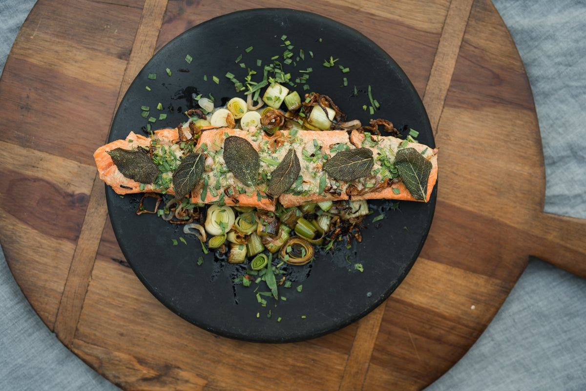 Apple Cider Poached Steelhead with Braised Leeks and Brown Butter Tarragon Mustard