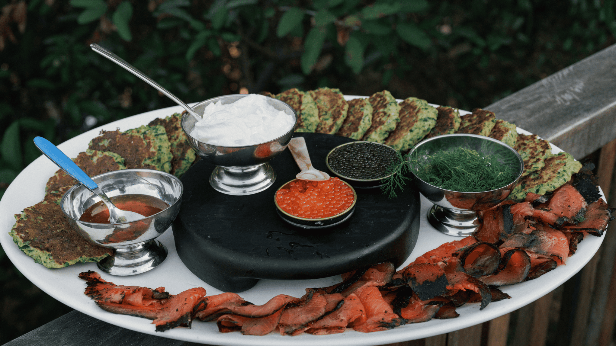 Courgette Fritters with Pastrami Smoked Lox and Hot Honey - SEATOPIA