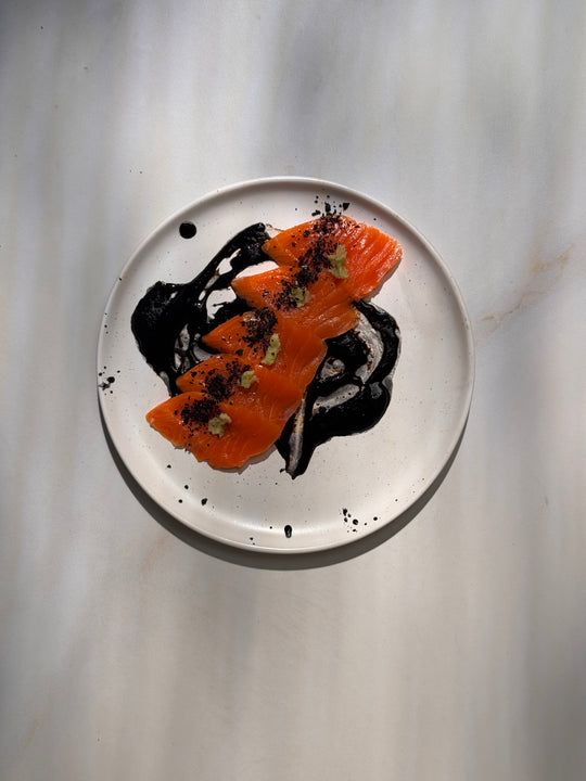 Black Garlic Tamari Steelhead Sashimi with Activated Charcoal + Fresh Wasabi - SEATOPIA