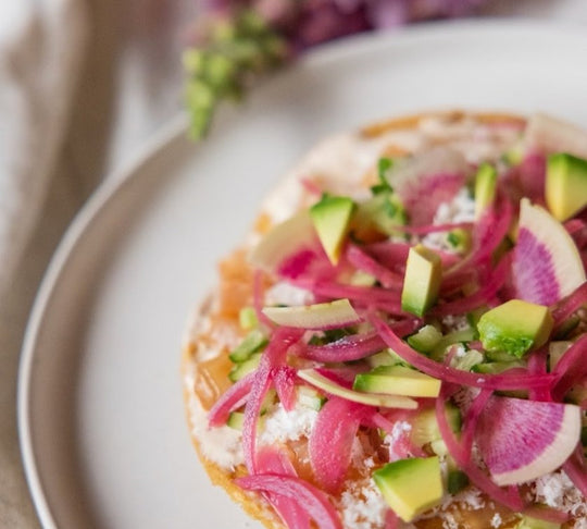 Yellowtail Tostada with Roasted Corn Labneh, Pickled Red Onion, and Watermelon Radishes - SEATOPIA