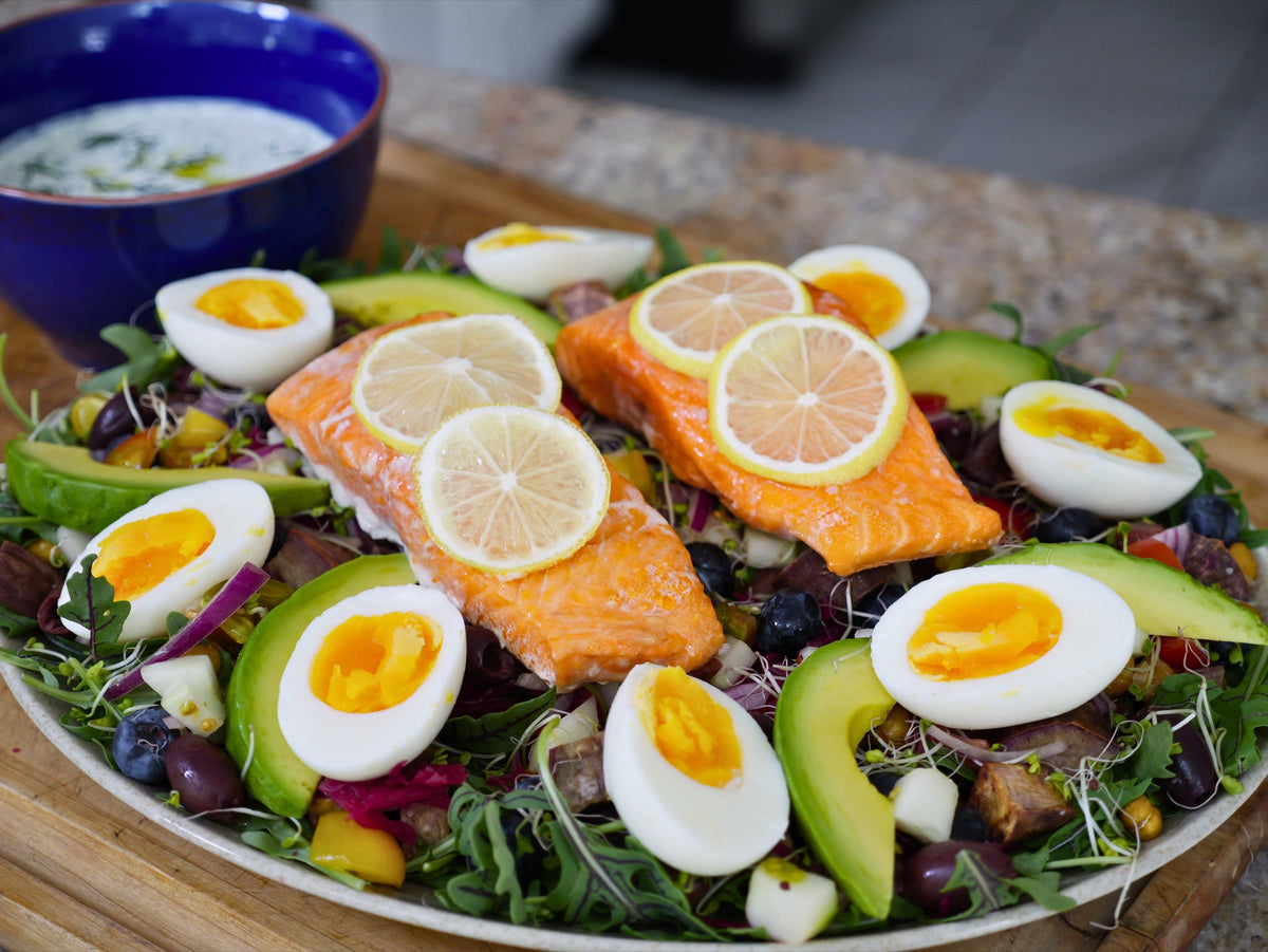 The finished Centenarian Salmon Salad platter with tzatziki, seen from the side